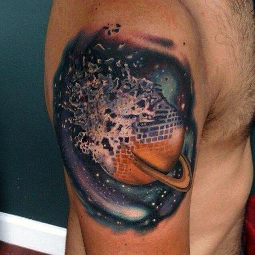 Cosmic-themed tattoo of a shattered disco ball as a planet with rings, blending space and retro aesthetics in a dynamic, colorful design.