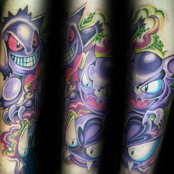 Colorful full-sleeve tattoo of Gengar, Haunter, and Gastly with vivid neon hues, electric outlines, and bold cartoon-style expressions.