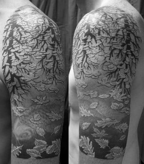 MC Escher-inspired sleeve tattoo blending tree branches into falling leaves that flow seamlessly down the arm in a surreal transition.