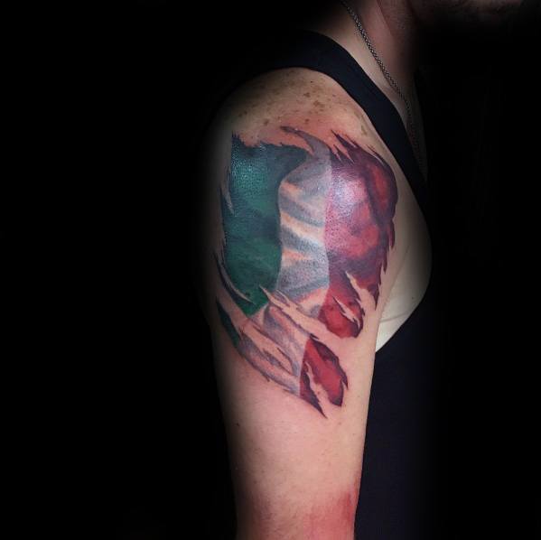 Upper arm tattoo with a torn skin effect revealing the Italian flag underneath, symbolizing deep-rooted national pride and heritage.