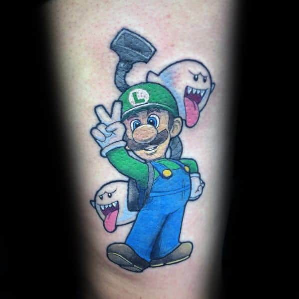 Tattoo of Luigi wearing his Poltergust, flashing a peace sign, with two Boo ghosts in the background, inspired by Luigi’s Mansion.