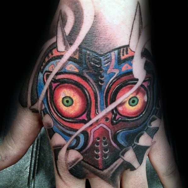 Incredible Majoras Mask Tattoos For Men On Hand