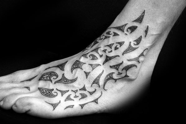 Incredible Negative Space Guys Hawaiian Tribal Tattoos On Foot