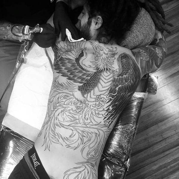 Incredible Phoenix Back Tattoo Designs For Guys