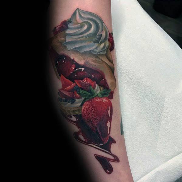 Realistic strawberry pie tattoo with whipped cream and dripping syrup, featuring vibrant details for a bold and mouthwatering dessert design
