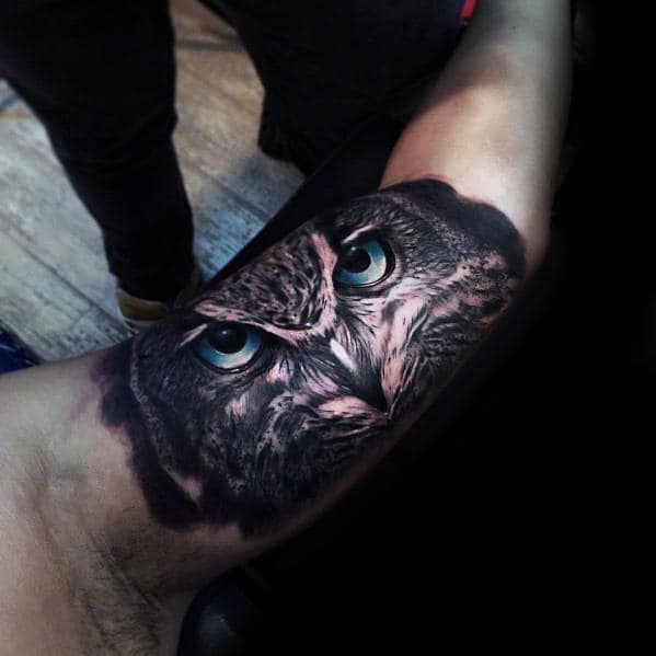 Incredible Realistic Inner Arm Bicep Male Owl With Blue Eyes Tattoo