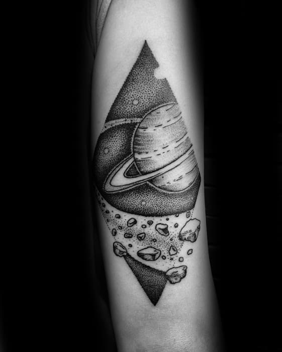 Dotwork Saturn tattoo design for men featuring a triangle frame, detailed shading, and floating asteroids in a cosmic scene.
