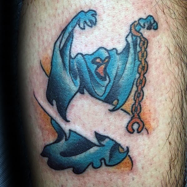 Tattoo of the Scooby-Doo ghost villain with glowing eyes, tattered cloak, and broken chain, rising from a swirling orange mist.