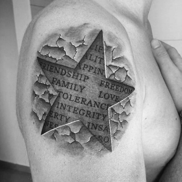 3D star tattoo on shoulder with a cracked stone effect, revealing engraved words like family, love, and integrity beneath the surface.