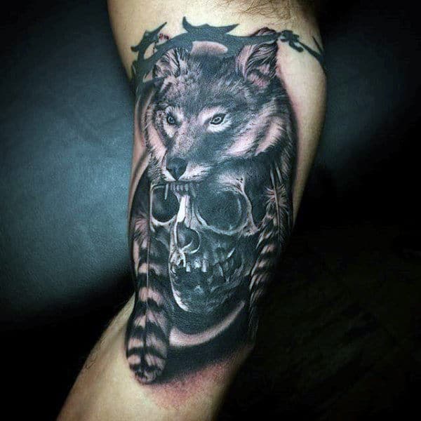 Indian Wolf And Feather With Skull Tattoo On Legs For Males