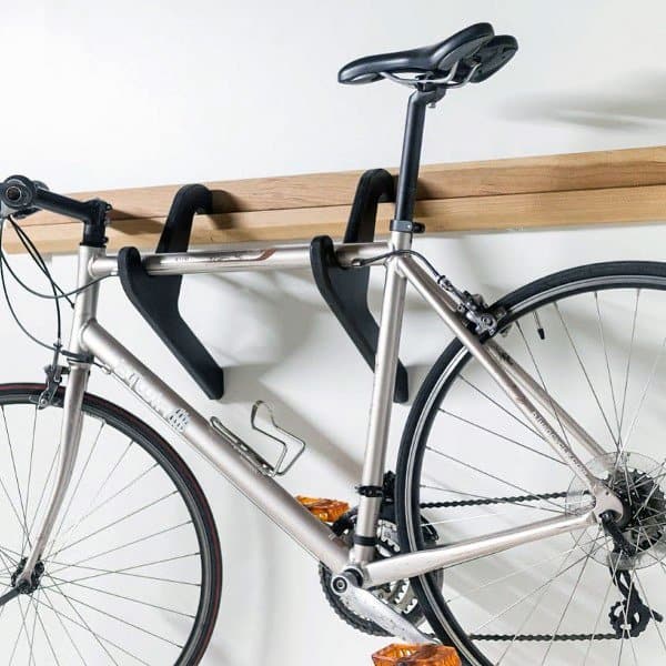 Wall-mounted horizontal bike racks for secure and sleek indoor bicycle storage.