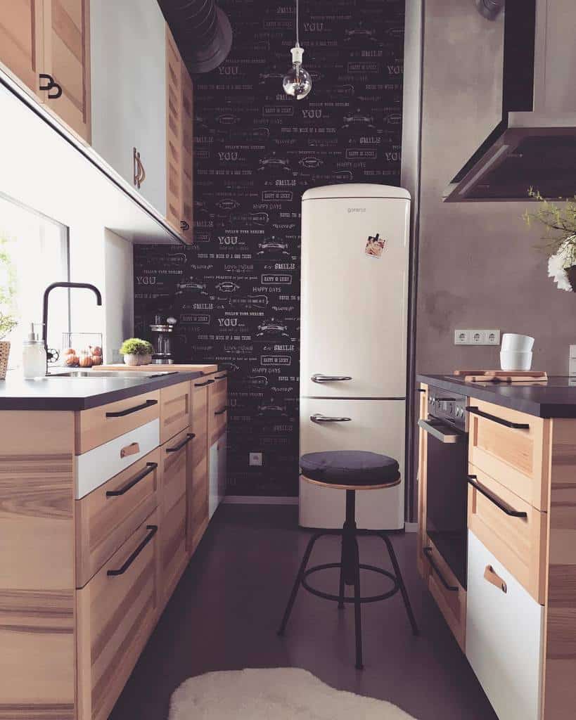 modern kitchen wood cabinets black accents vintage fridge quote wallpaper stool