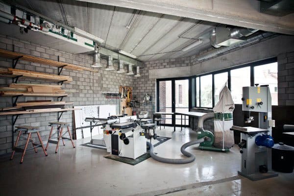 industrial garage workshop gray stone wall concrete floor