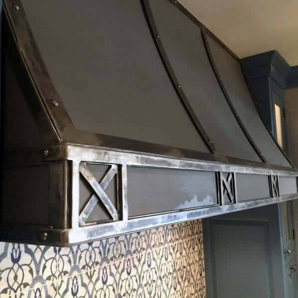 ornate kitchen hood with borders