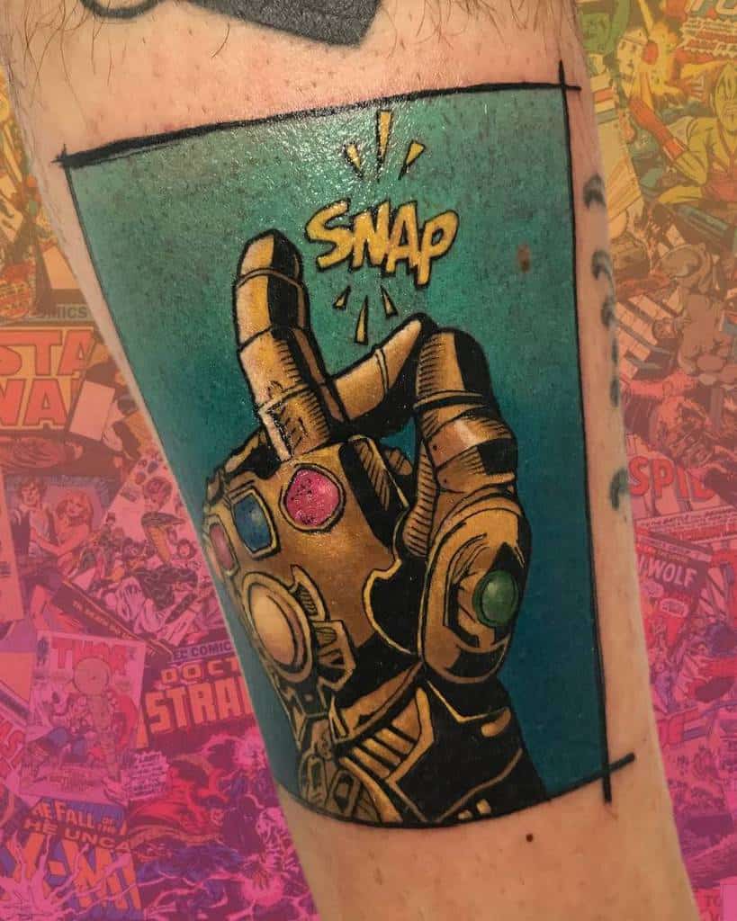 Comic-style Thanos tattoo featuring the Infinity Gauntlet mid-snap, with vibrant colors and bold lines for a striking design.