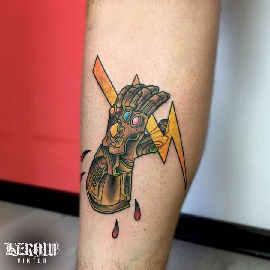 Infinity Gauntlet tattoo with a dramatic severed hand design, lightning bolt background, and blood drops