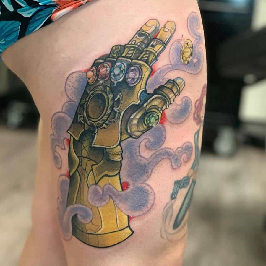 Infinity Gauntlet tattoo with missing stones, swirling cosmic smoke, and vibrant shading