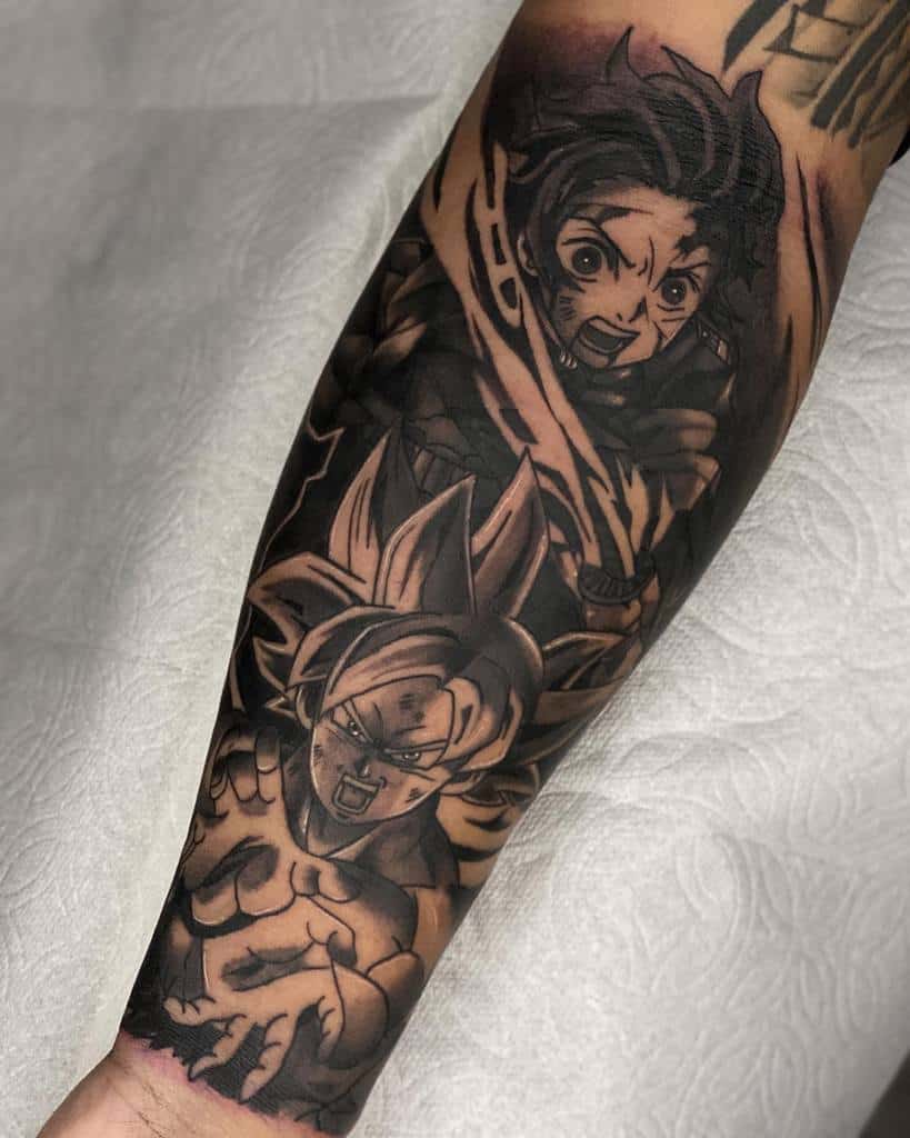 A black-and-grey tattoo of Goku from Dragon Ball and Tanjiro from Demon Slayer, each executing their signature moves with intense expressions and dynamic poses.