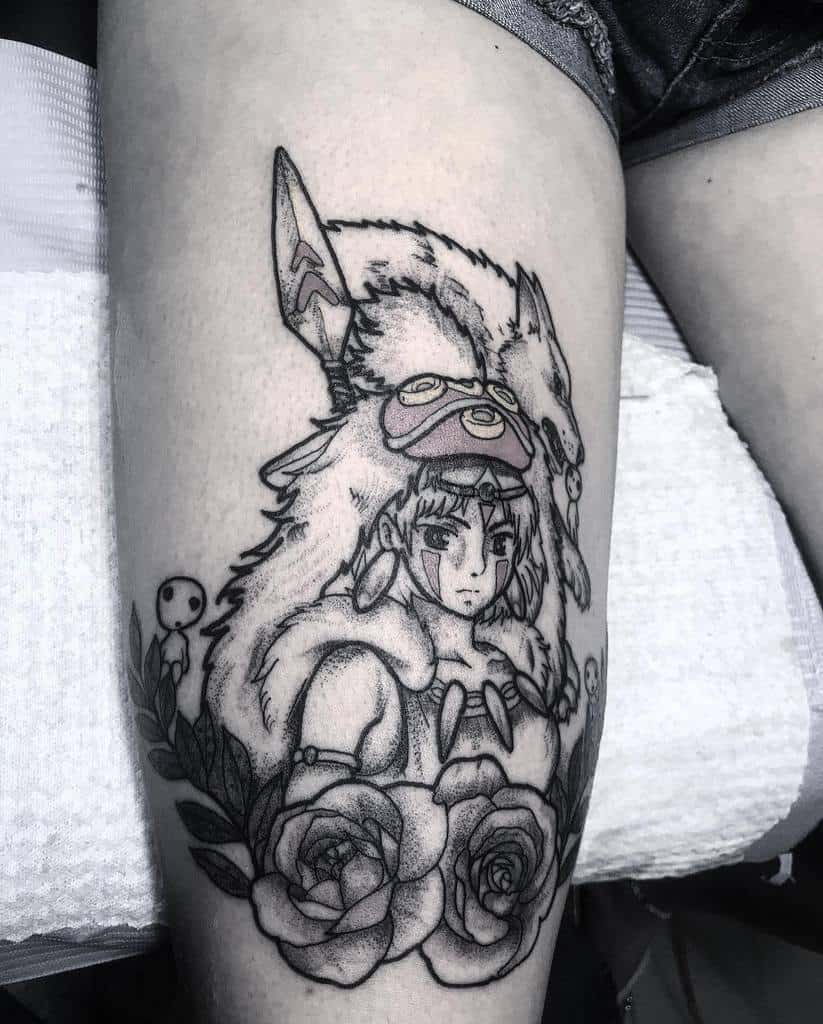 Black and grey tattoo of San from Princess Mononoke, wearing her wolf pelt, with kodama spirits and roses in a detailed design.