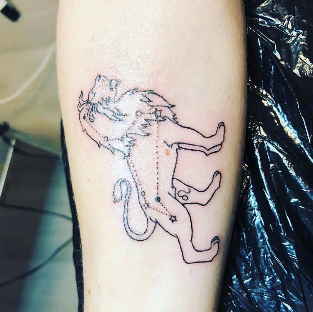 Minimalist roaring lion tattoo with the Leo constellation incorporated into its body, symbolizing strength and astrology.