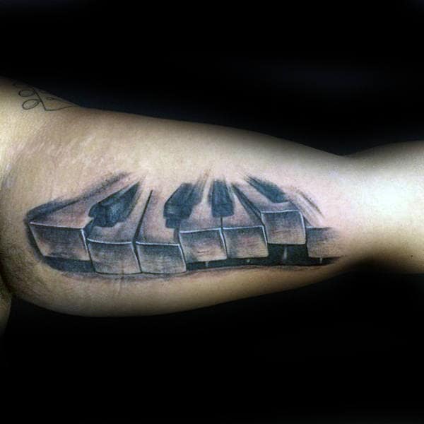 Inner Arm Bicep Male Shaded Tattoo Of Piano Keys