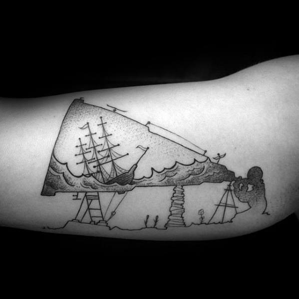 Minimalist tattoo of a ship on a wave, with a person looking through a telescope toward the ship