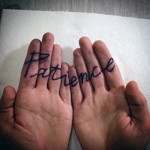 Patience" tattooed across both hands' palms that align when placed side by side