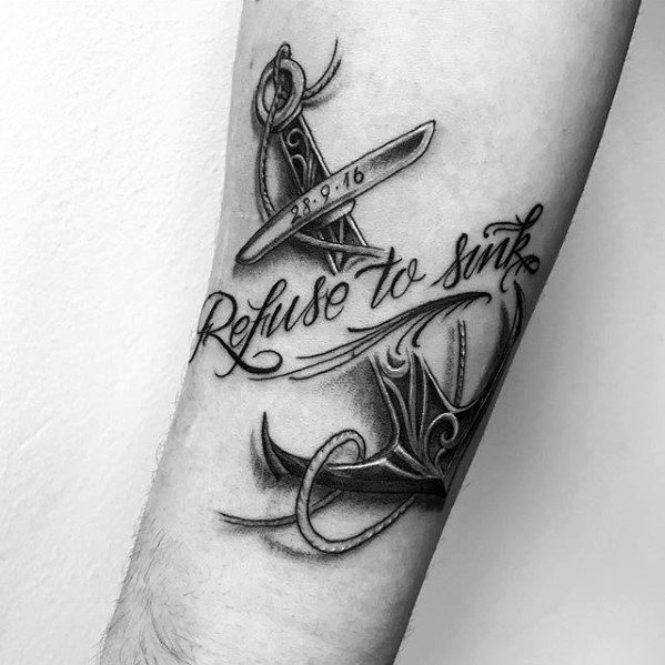 Tattoo of an anchor with "Refuse To Sink" inscribed on a forearm with a date engraved on the anchor