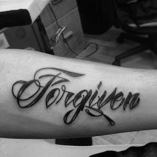 Inner Forearm Forgiven Black Ink Mens Word Tattoo