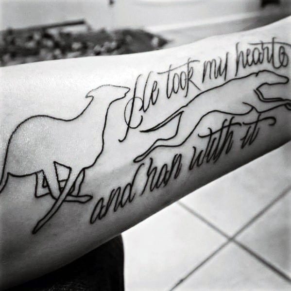 A meaningful tattoo featuring a greyhound in motion with the phrase "He took my heart and ran with it" in elegant script, symbolizing love and loyalty.