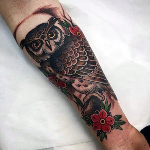 Inner Forearm Male Tattoo Of Traditional Owl And Red Flowers