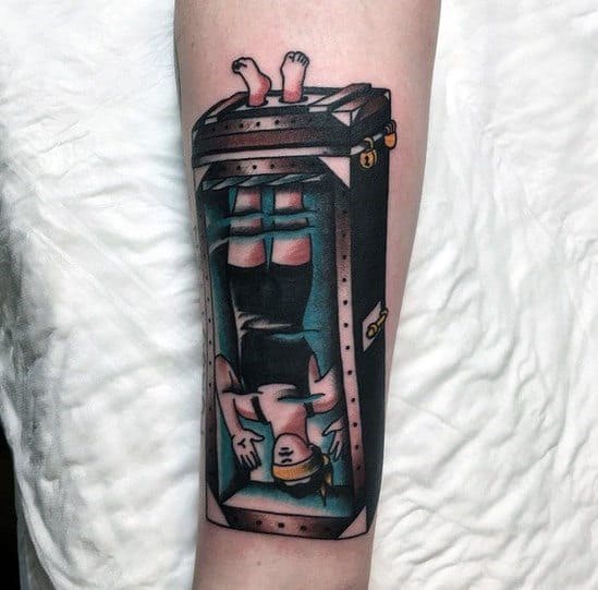 Tattoo of an escape artist inside a water tank, a nod to classic magician stunts
