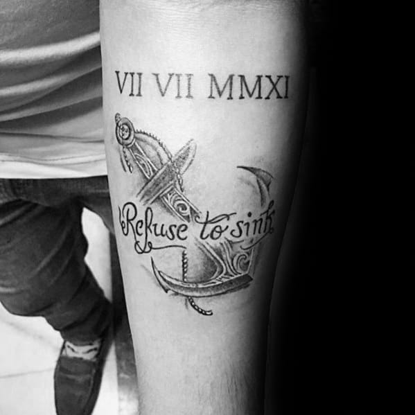 Forearm tattoo with an anchor, "Refuse to sink," and Roman numerals VII VII MMXI