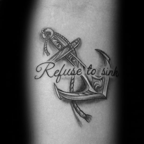 Black and gray tattoo of an anchor with a rope and the phrase "Refuse to Sink" 