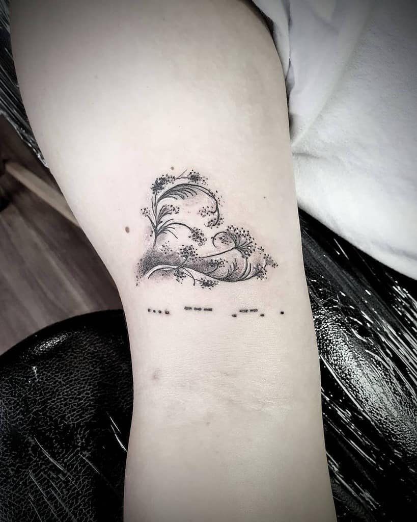 Elegant dandelion tattoo forming a heart shape with delicate dot work and Morse code text, symbolizing love, growth, and hidden messages.