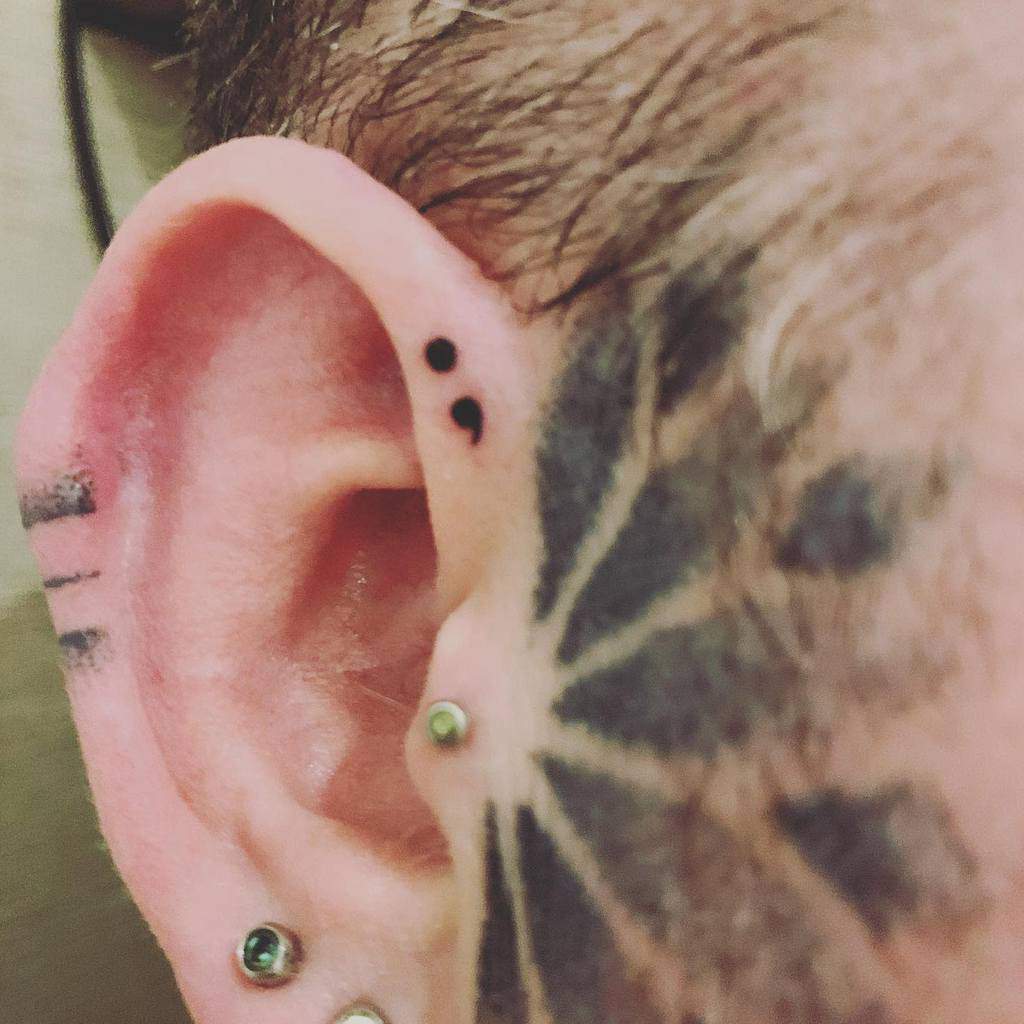 Inside Earlobe Tiny Semicolon Tattoo