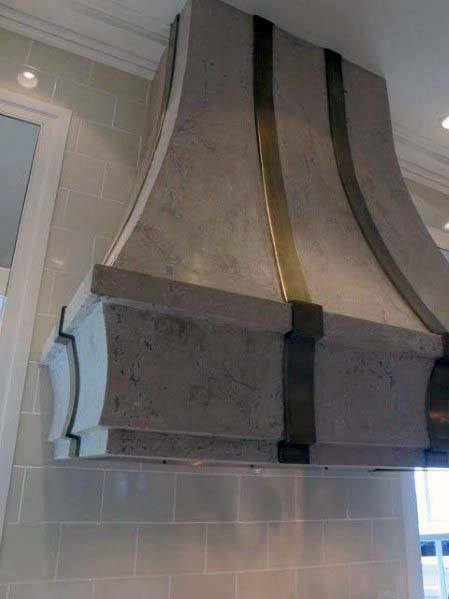 large concrete kitchen hood