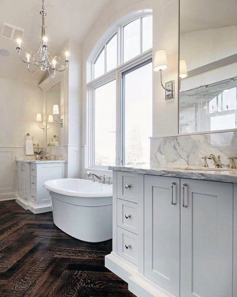 large elegant white master bathroom