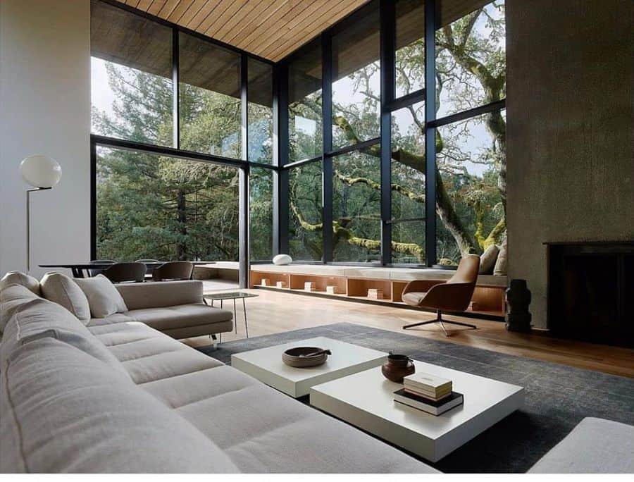 large living room with floor to ceiling windows