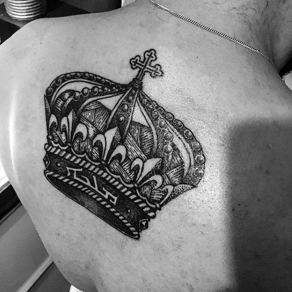 Intricately Designed Crown Tattoo On Back For Men