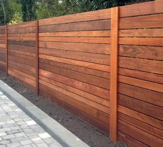 wooden fence with varied panel sizes