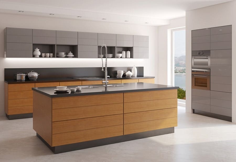 Modern kitchen with wood and gray cabinets, a spacious island with sink, and light streaming through a window