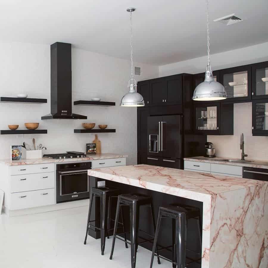 industrial kitchen marble island black stools