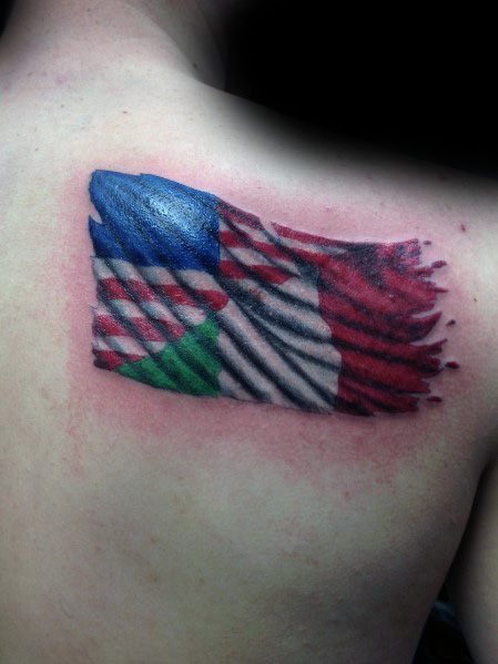 Back tattoo of a tattered Italian flag blended with another flag, symbolizing heritage and cultural pride with a realistic waving effect.