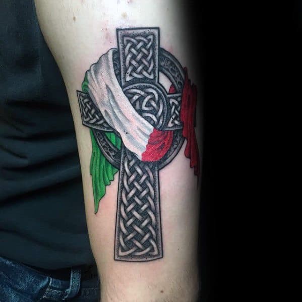 Celtic cross tattoo with intricate knotwork, draped in the Italian flag, symbolizing a blend of heritage, faith, and cultural pride.