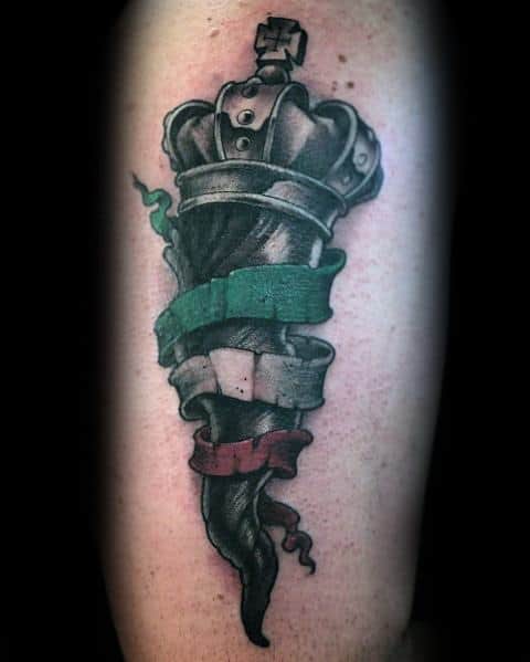 Black Italian horn tattoo with a crown and tricolor ribbon, symbolizing strength, heritage, and protection.