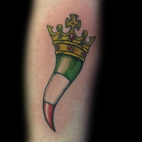 Italian horn tattoo with a golden crown and tricolor design, symbolizing heritage, luck, and protection.