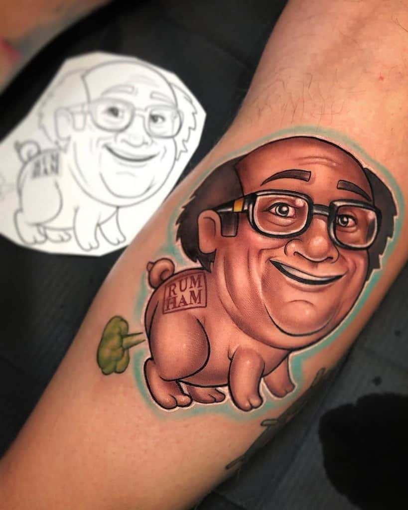 A colorful tattoo of a hybrid caricature featuring a man's face on a pig’s body, labeled 'RUM HAM,' with a comical fart cloud, blending humor and realism.