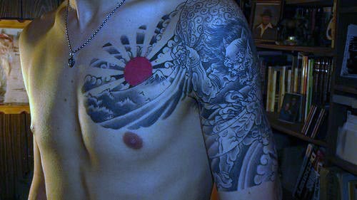 Japanese Rising Sun Ray Tattoo For Men On Chest
