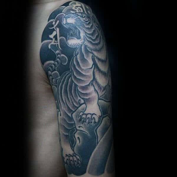 Japanese Tiger Climbing Rock Mens Half Sleeve Tradtional Tattoo Ideas